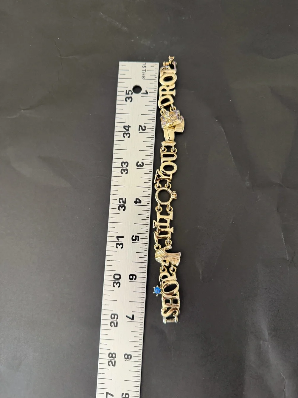 Gold Tone 'Shop Til You Drop' Charm Bracelet